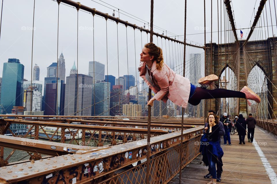 My sister posing in front of the Manhatten skyline