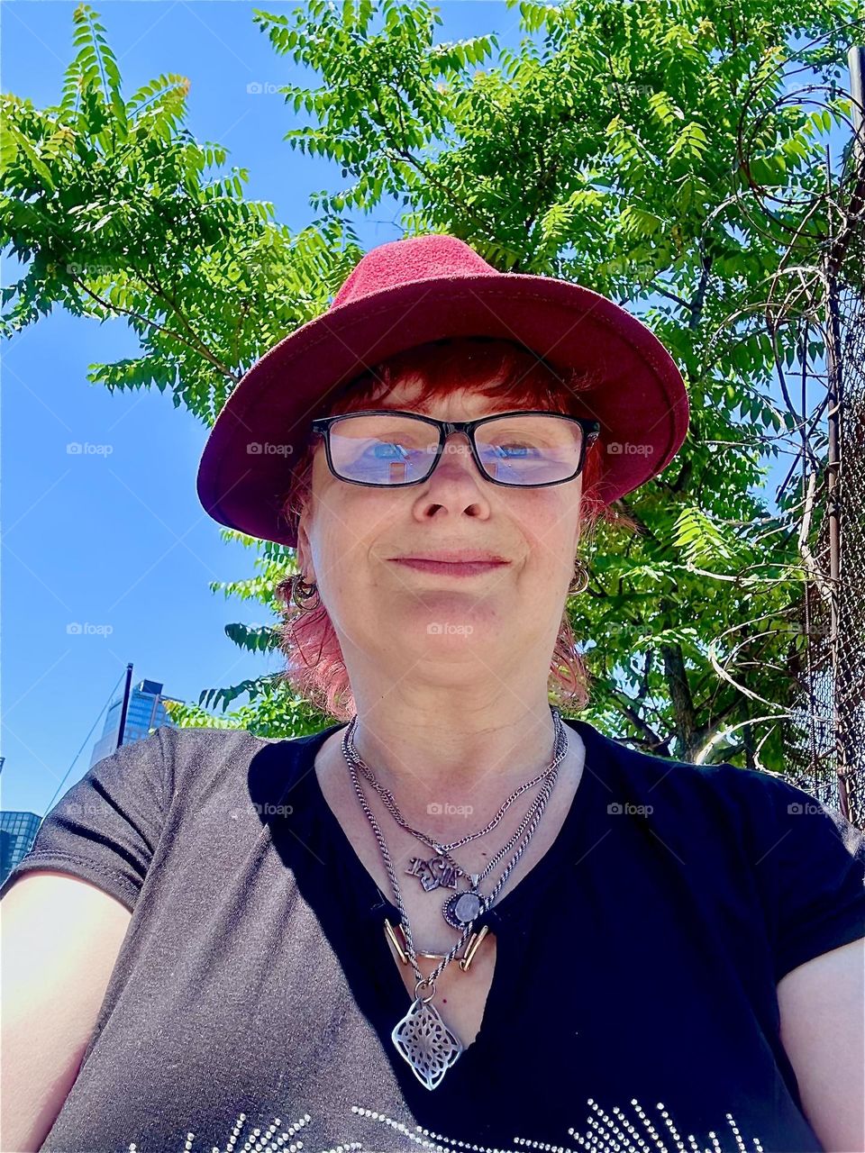 This is me, “Petra Schiller” a.k.a. “Maxine Firefox” a.k.a. “Maximiliane Feuerfuchs” standing in the parking lot by the “Pulaski Bridge” at “Newtown Creek” in LIC, Queens. 2024. Hypnotic Productions