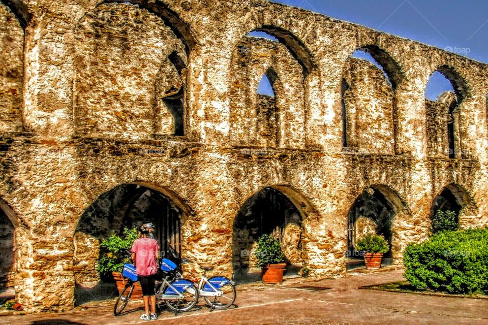 Bicyclists at Spanish Mission - cartoon style