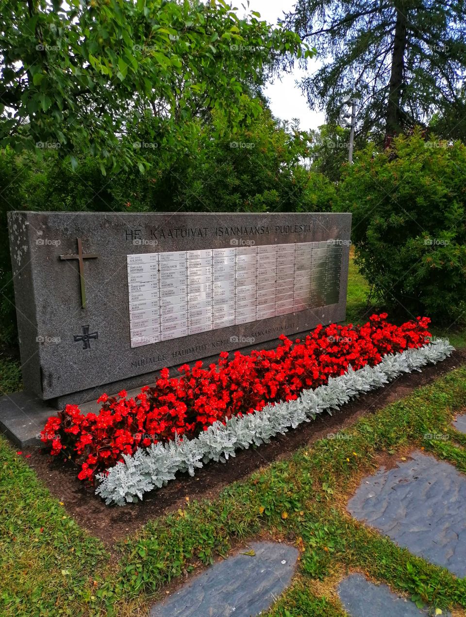 Beautiful summer flowers at cemetery
