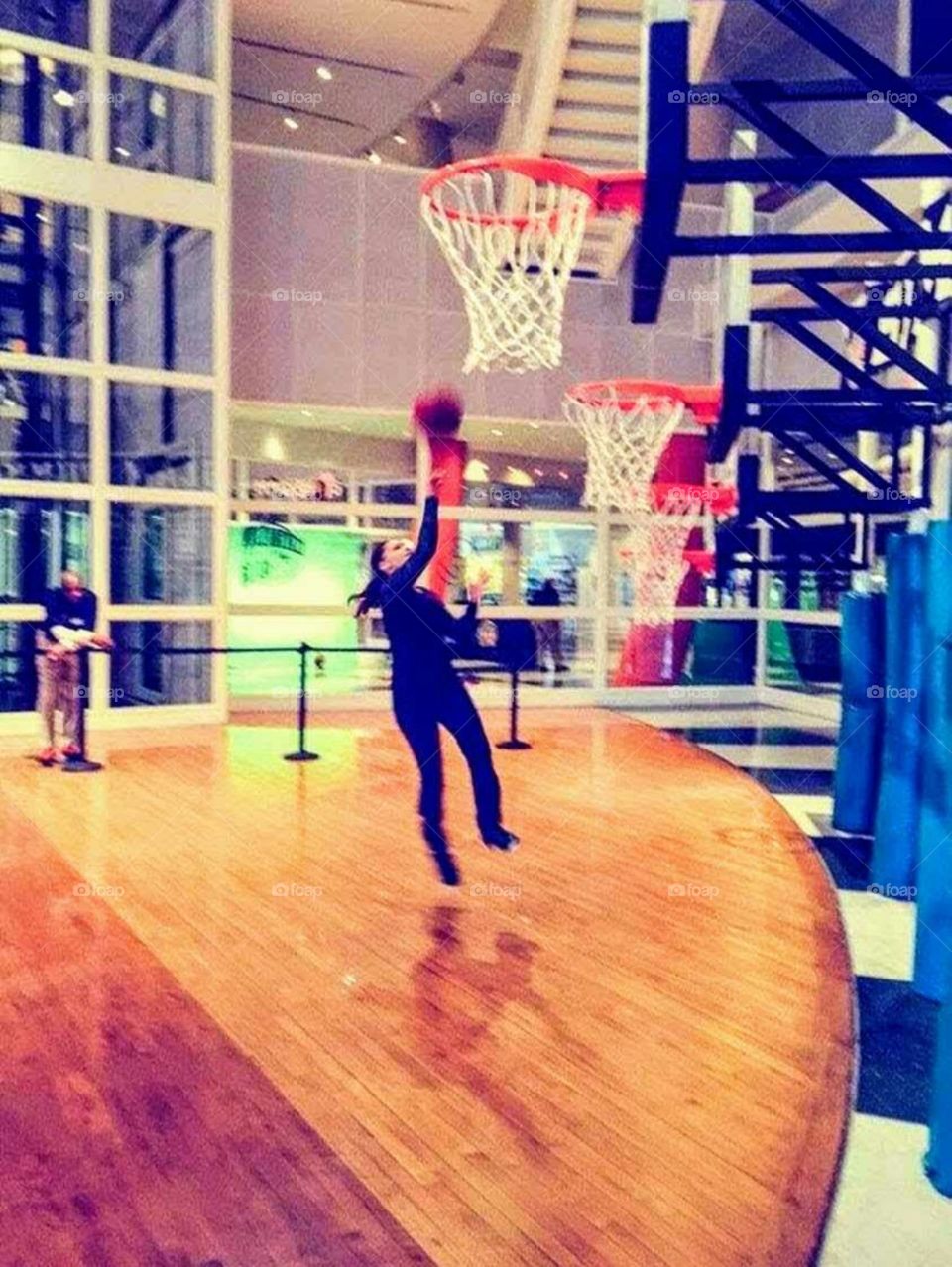 Taking the championship shot like the skilled athlete she is.My daughter going for gold,having fun at the Basketball Hall of Fame in our Hometown of Springfield,Massachusetts
