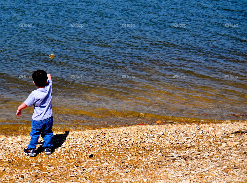 boy rocks bank texas by refocusphoto