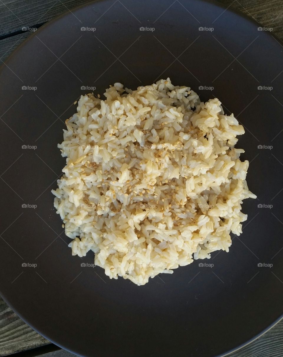 brown rice on brown plate