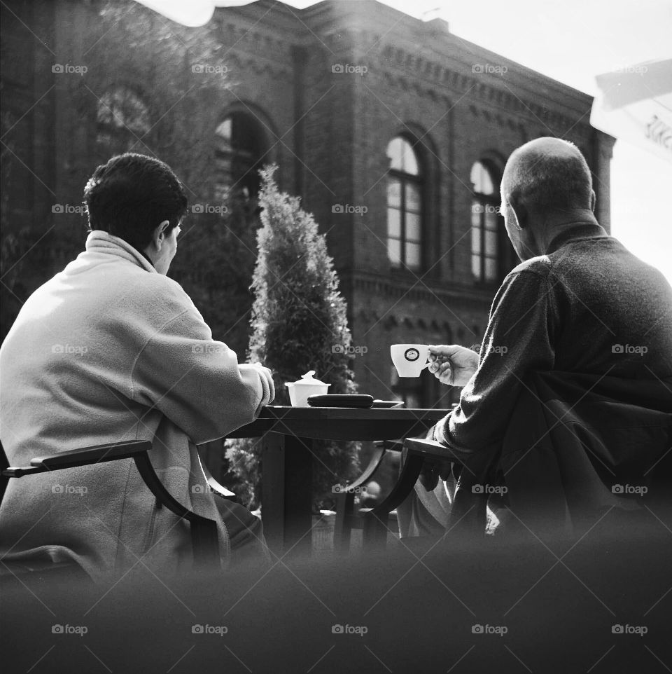 Mature couple drinking coffee together