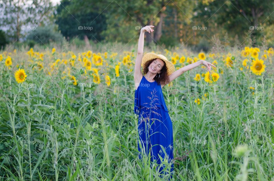 Beautiful Young Woman Dancing Outside in Nature