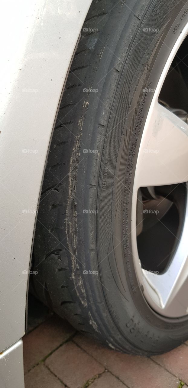 weared out tire on a car