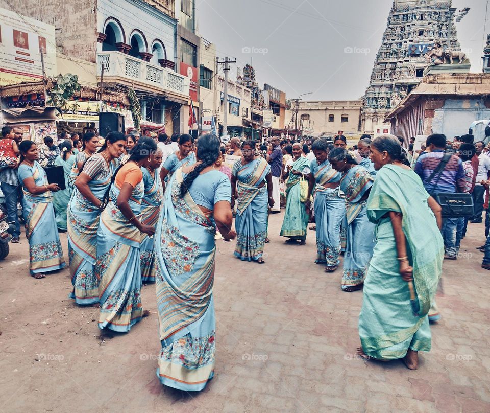 Women group - amateur - dance on the street while devotional  celebration 