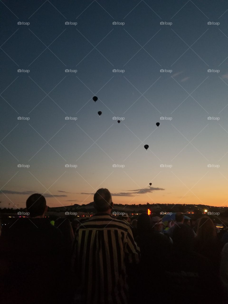 Hot air balloon races in Reno, NV while the sun rises