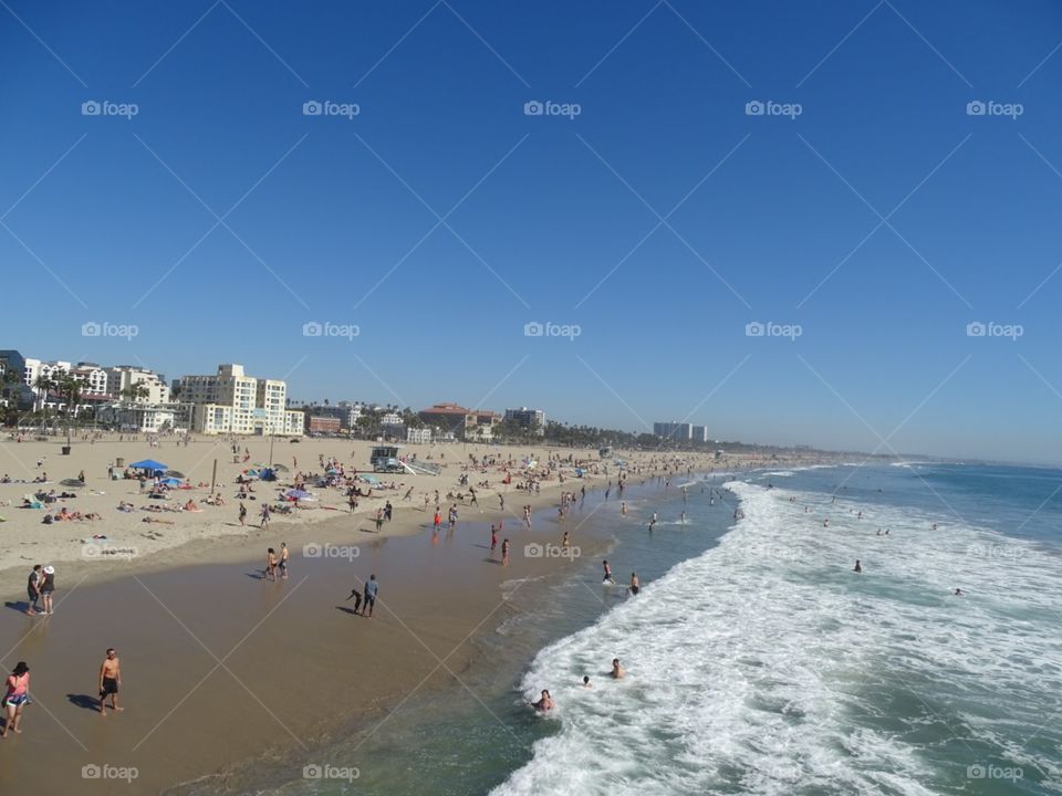 Santa Monica beach with deep blue skies.