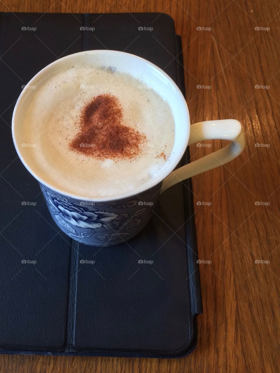 Cup of coffee with cinnamon heart