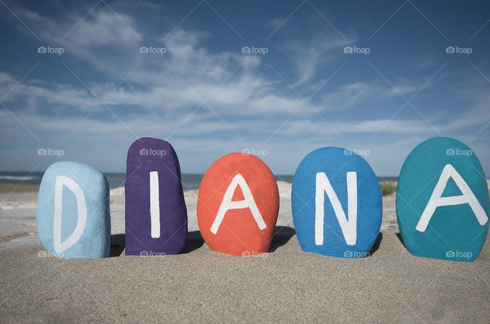 Diana, female name on colourful stones