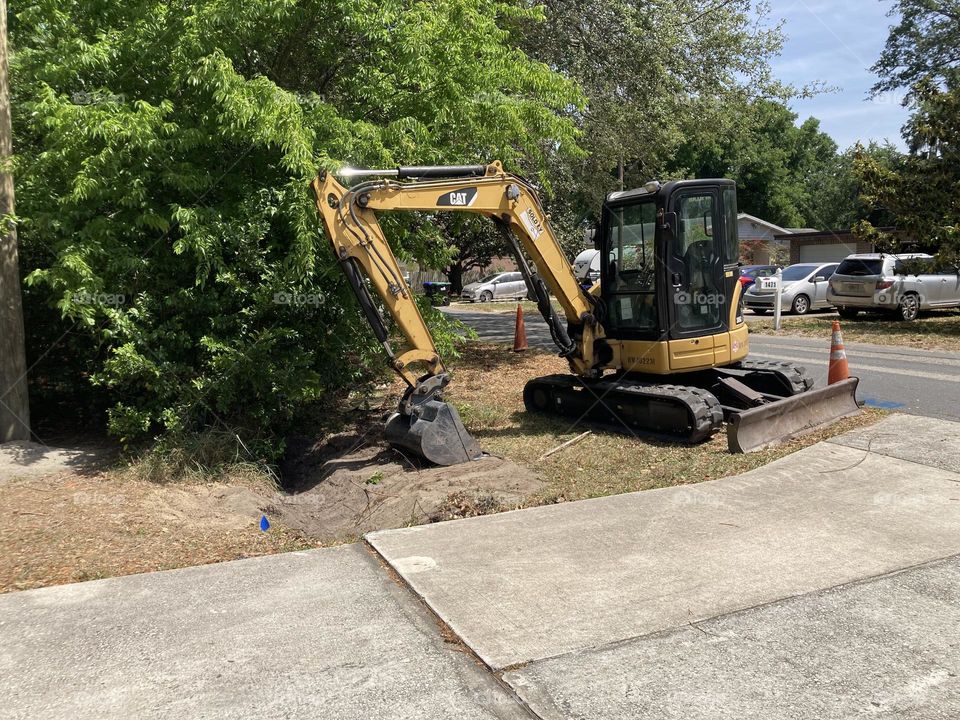 Earth digger at the house