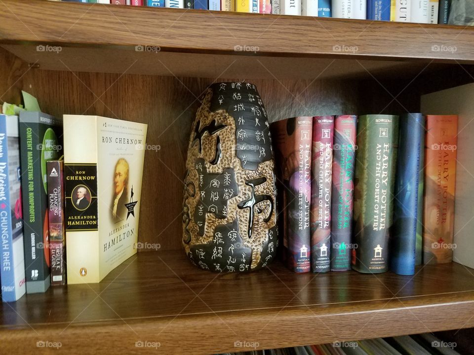 Bookshelf with vase