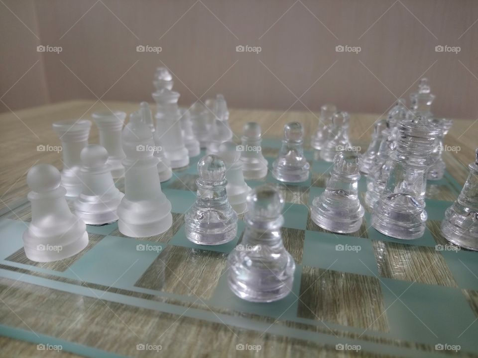 Chess set and board made from glass. Very decorative.