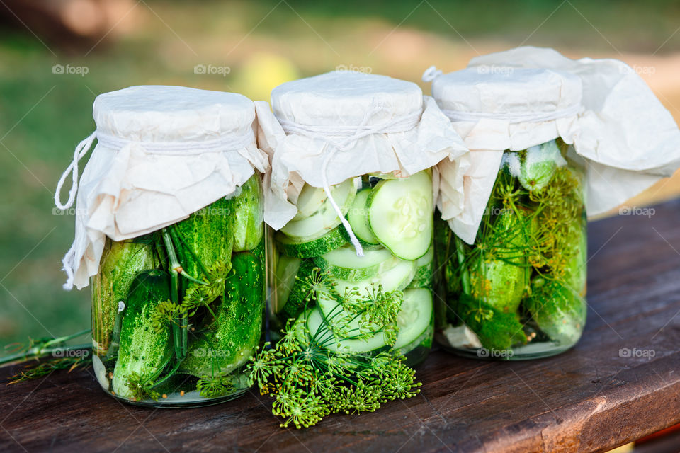 Pickled cucumbers. Pickled cucumbers made with home garden vegetables and herbs