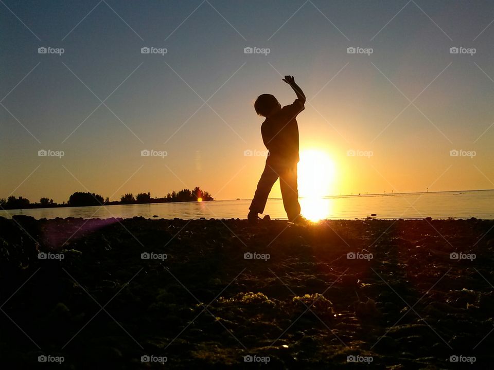 Silhouette of child during sunset
