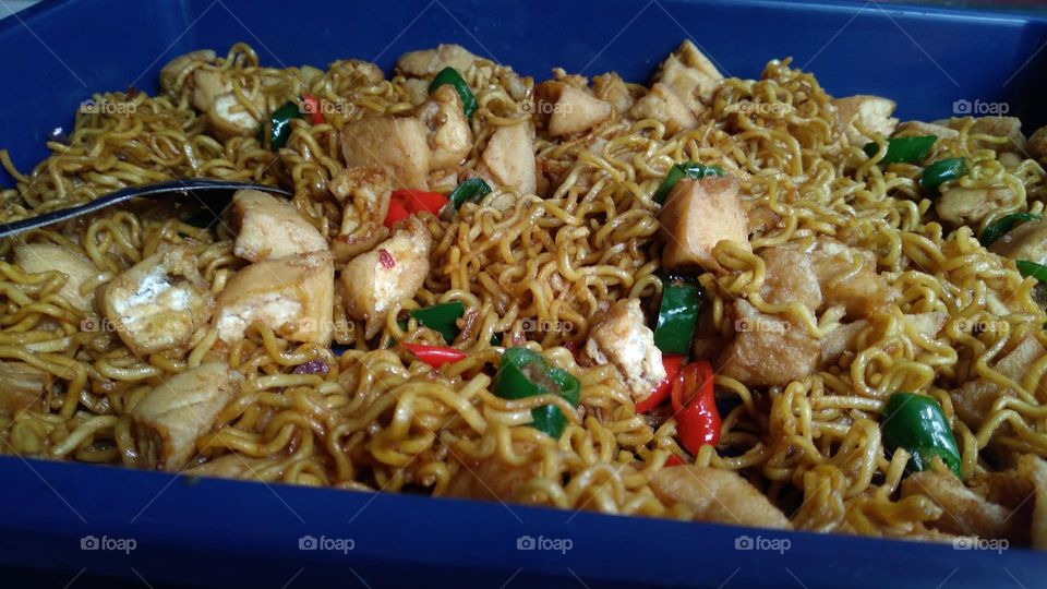 Tofu noodle dishes that are ready to be served or eaten