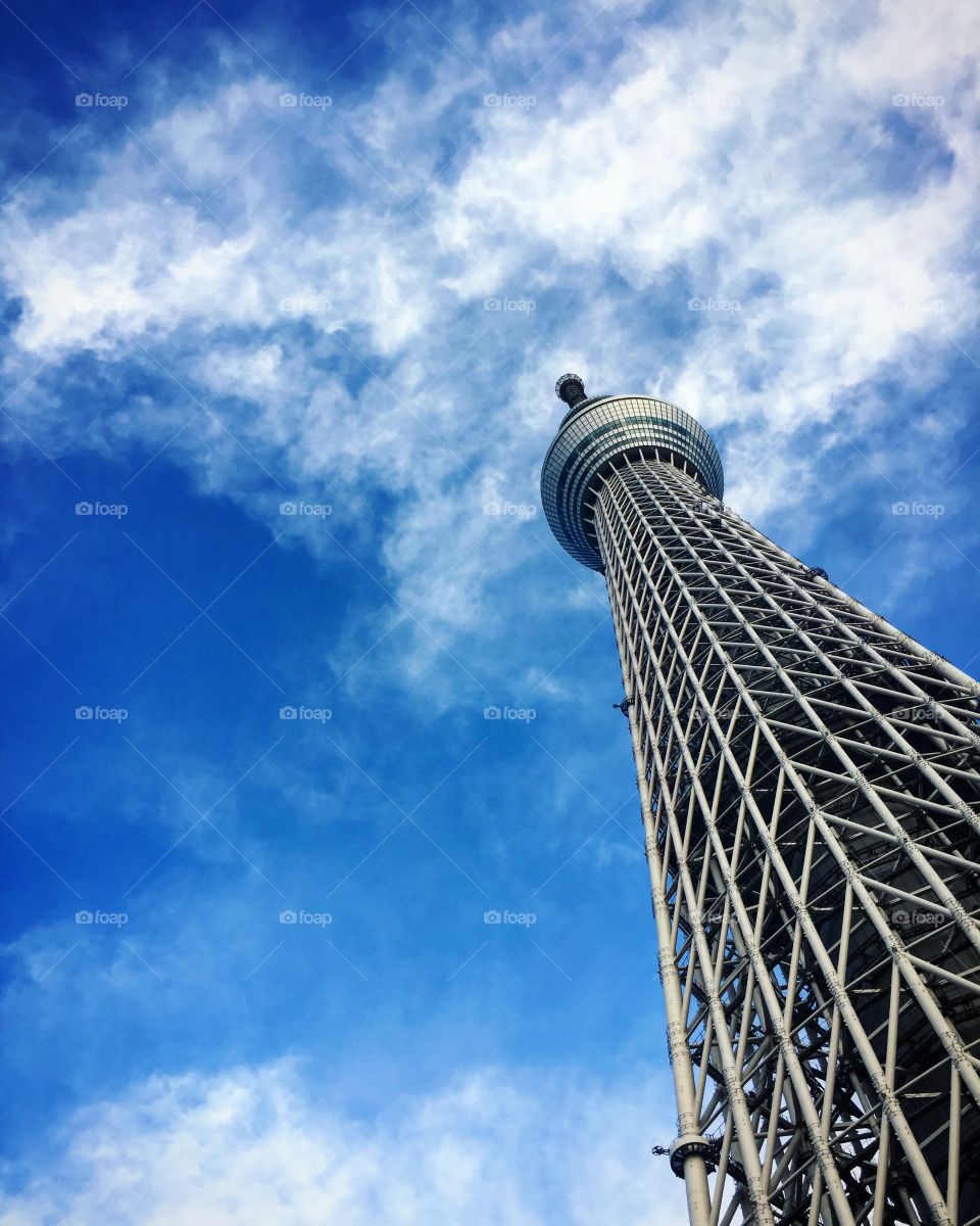 Tokyo tower against blue sky