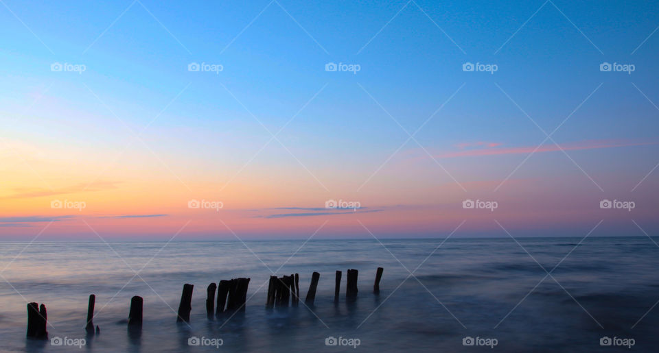 this photo was taken on the beautiful Baltic coast.  I love to live by the sea and every time of the day and season is beautiful and unique.