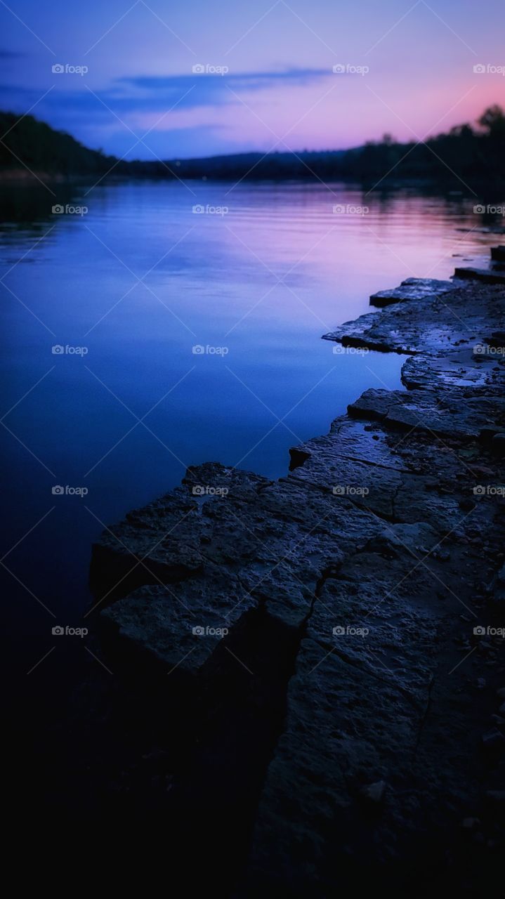 Nightfall reflections on the still water. 