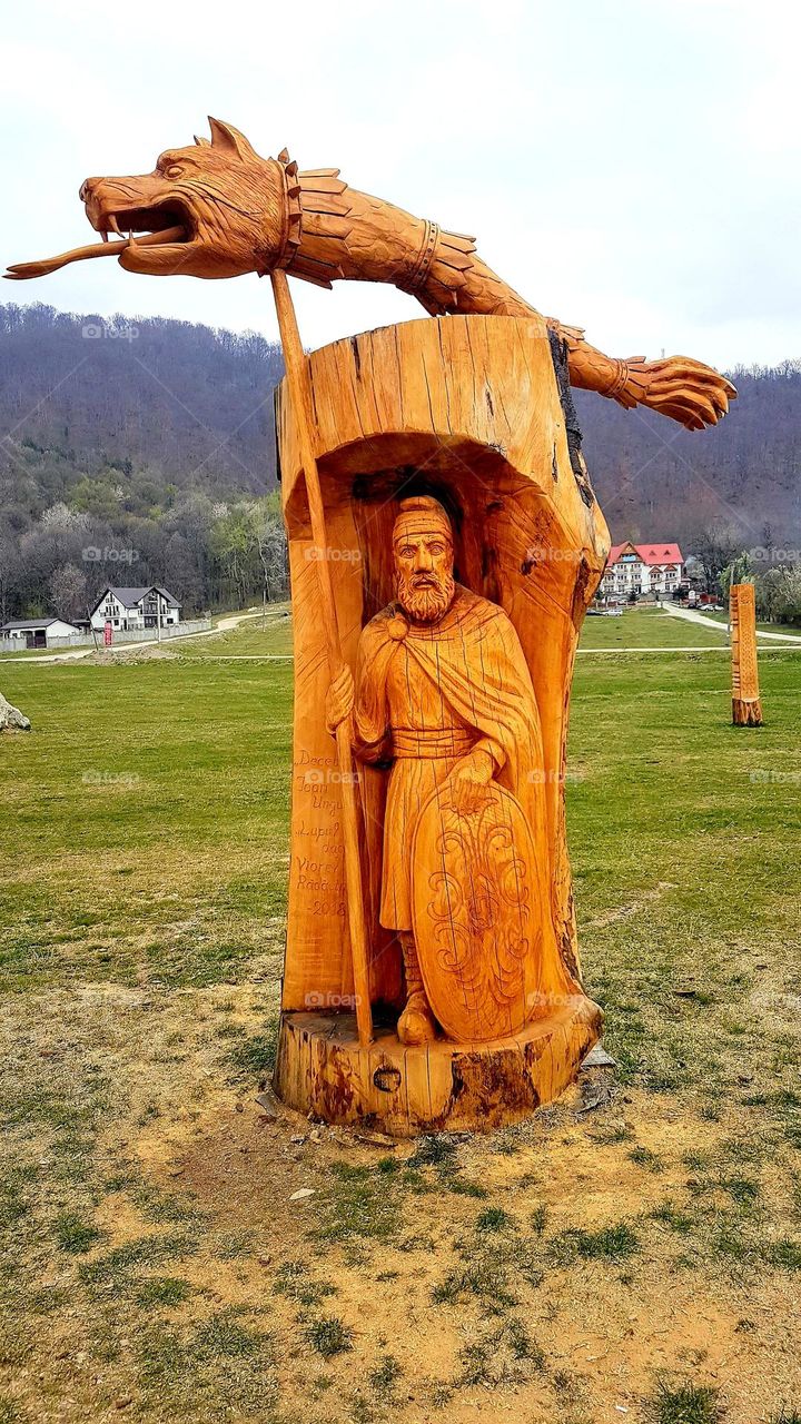 Dacian warrior carved in wood, Polovragi, Romania