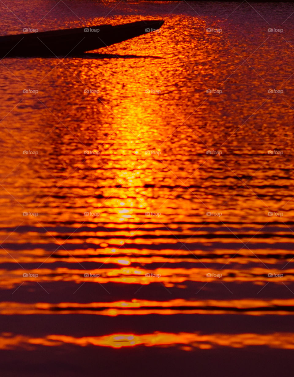 Reflection of water at sunset