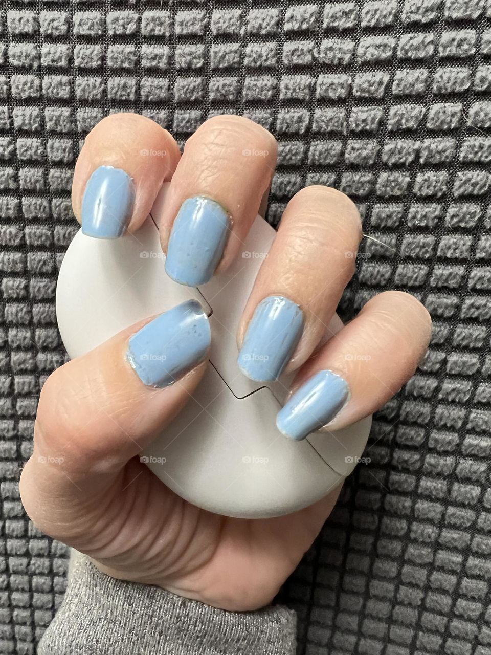 Soft blue manicure 