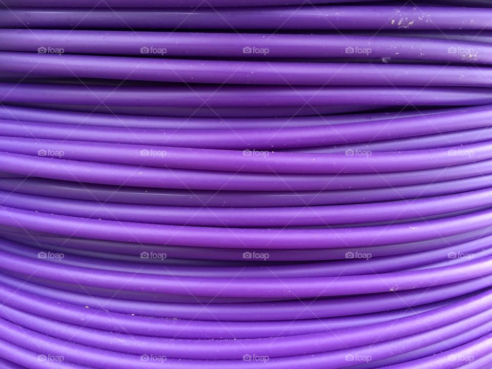 Close up of rolled up purple wire