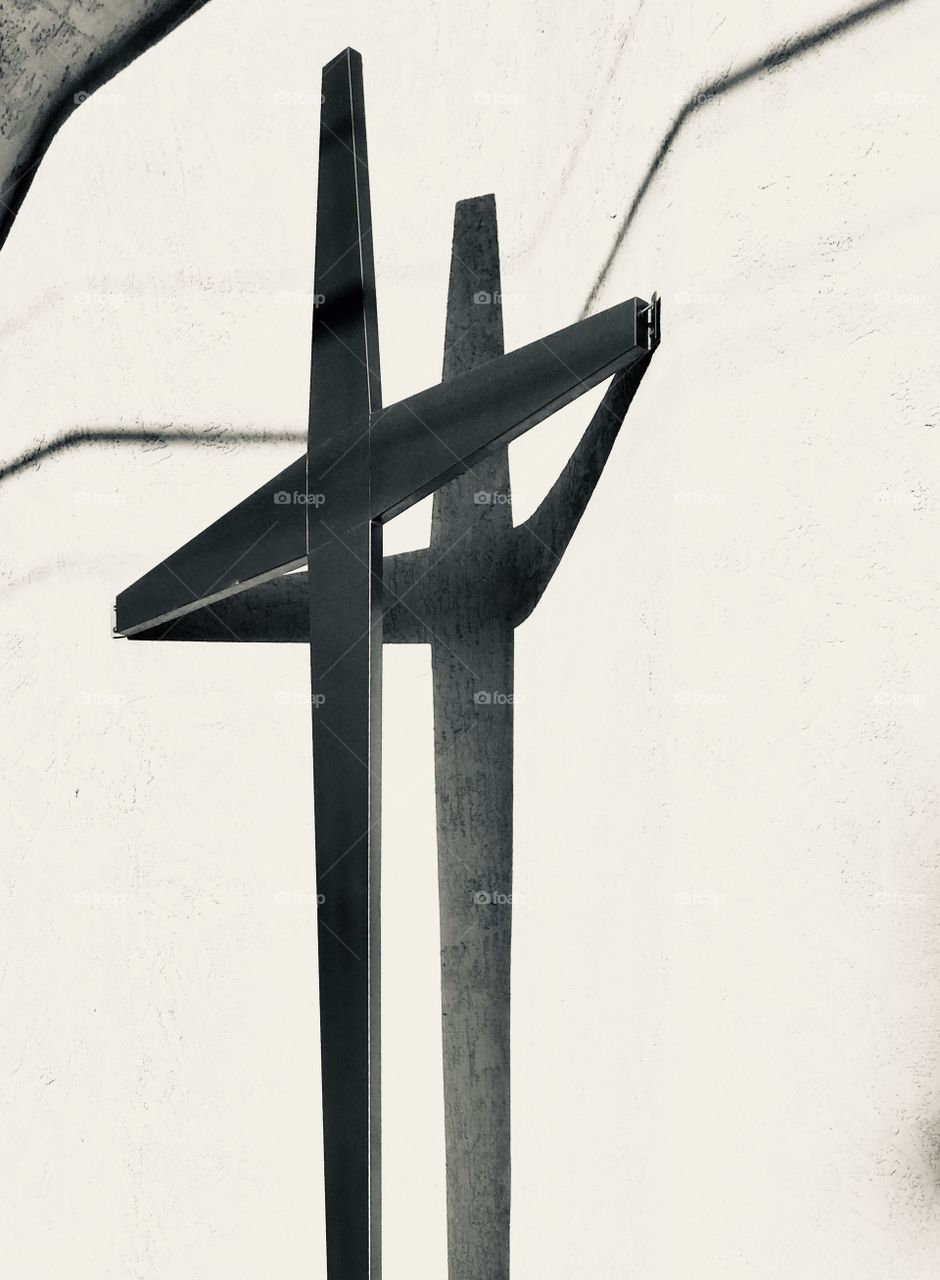 The cross on the wall of the church