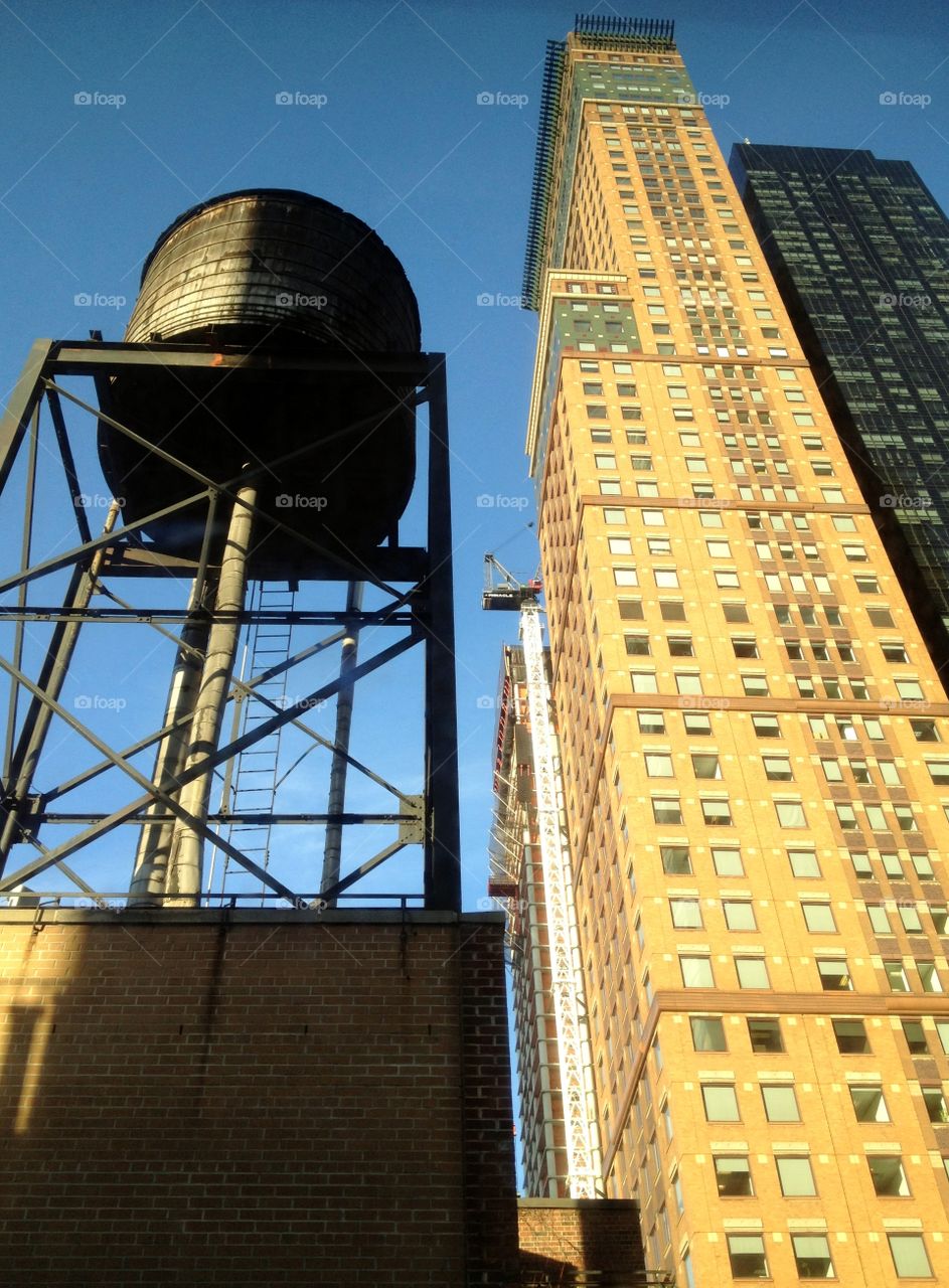 a skyscraper and a deposit in a city