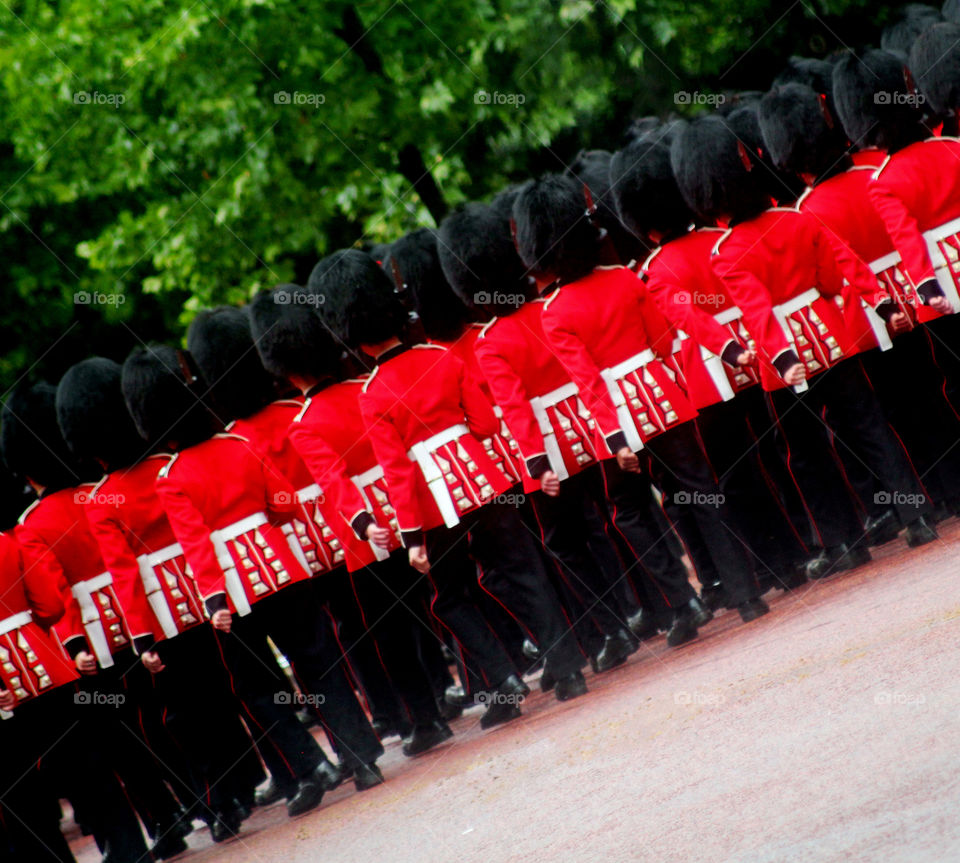 Marching guardsmen trooping of The Colour London England 