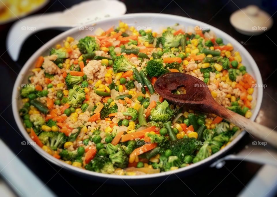 Vegetable fried rice in a round skillet