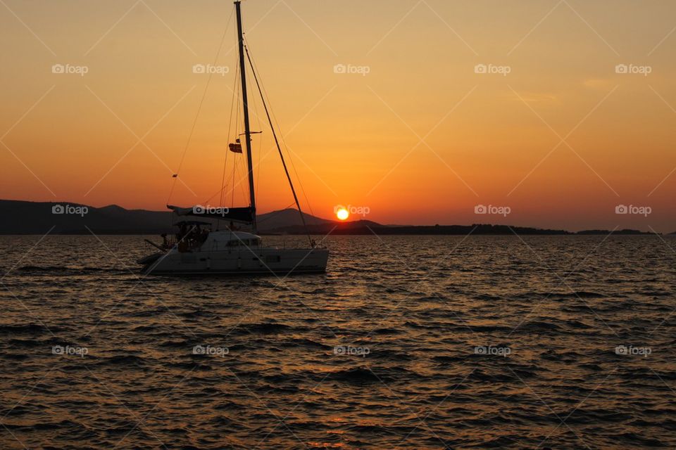 Sailing in sunset