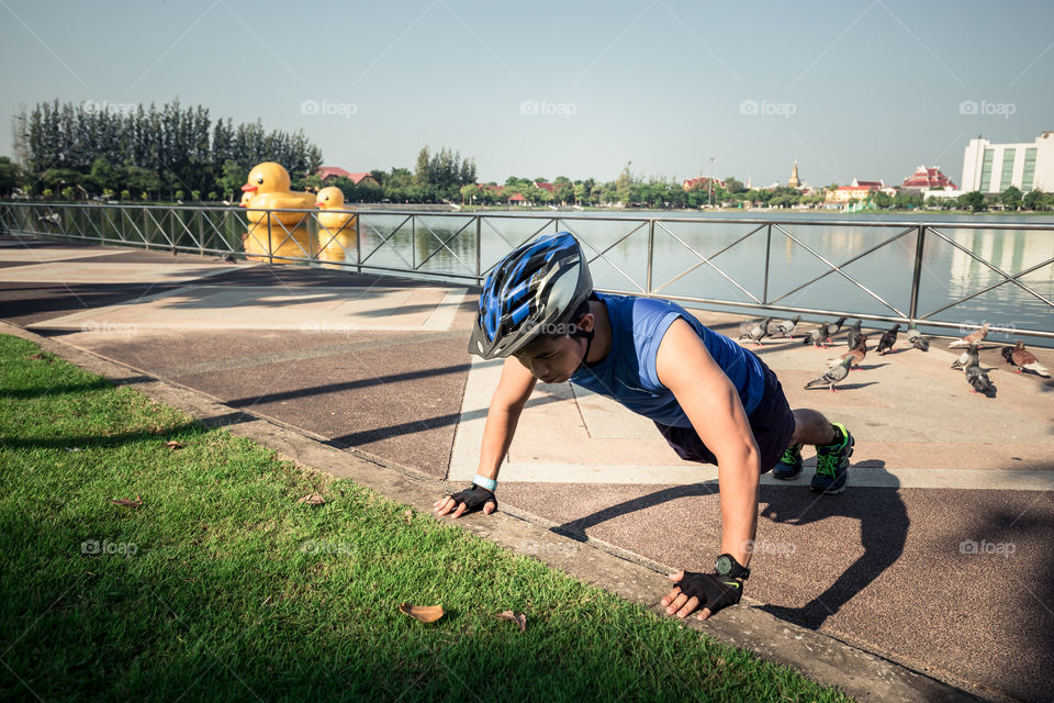 Man push up workout in the park 