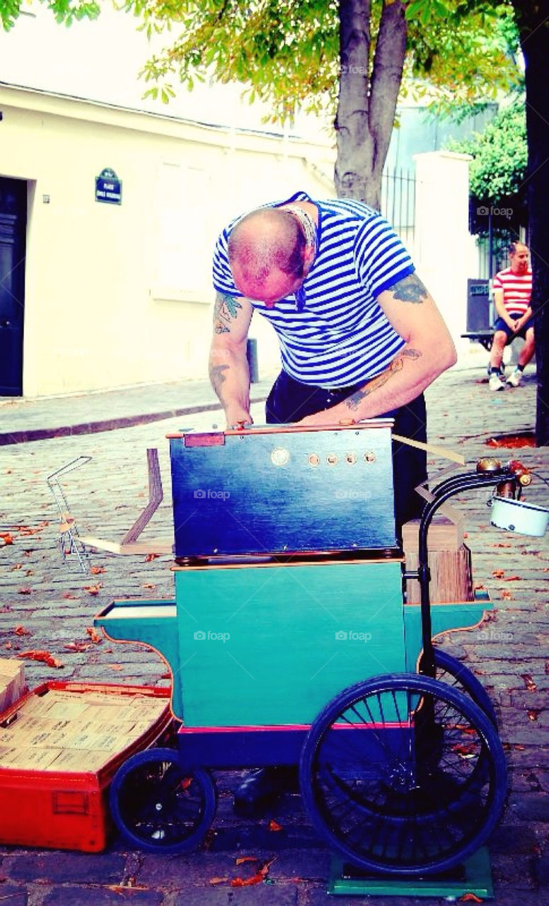The Barrel Organ man in Montmartre -Paris