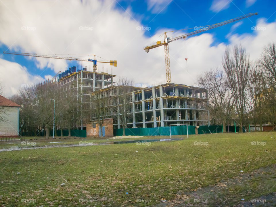 building process with crane on long exposure