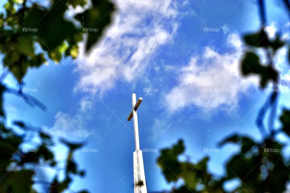 Cross on a church in summer. 