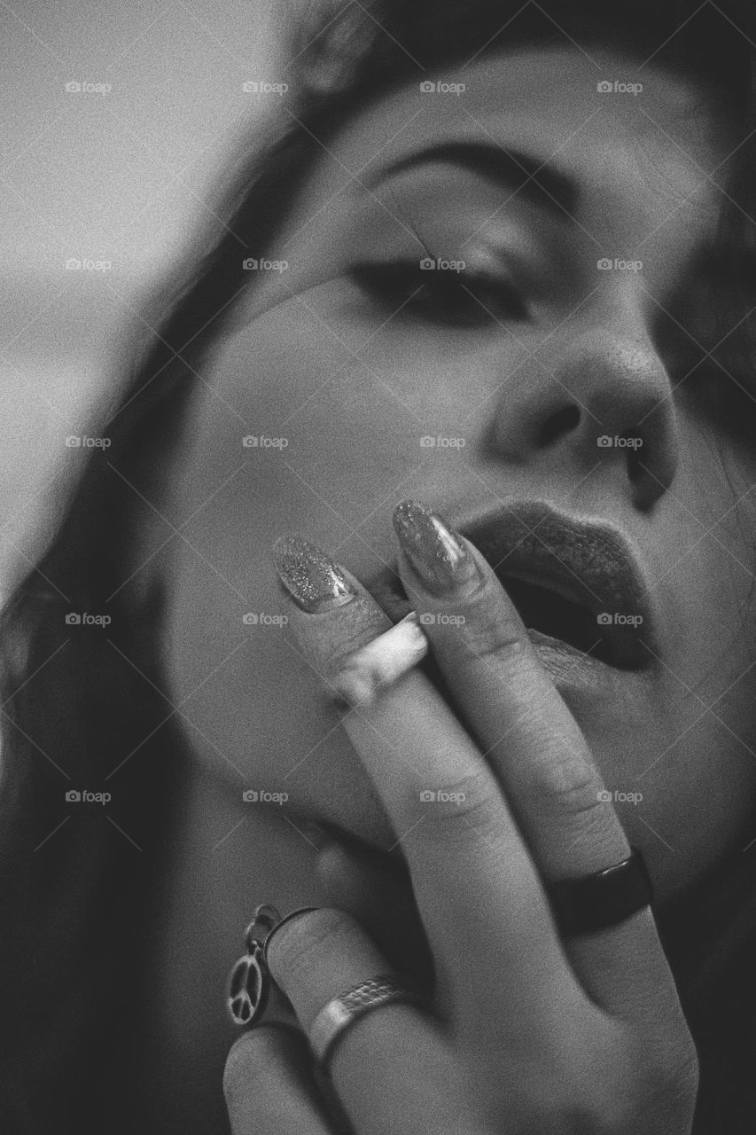 girl smokes, cigarette, woman , black and white photo, 