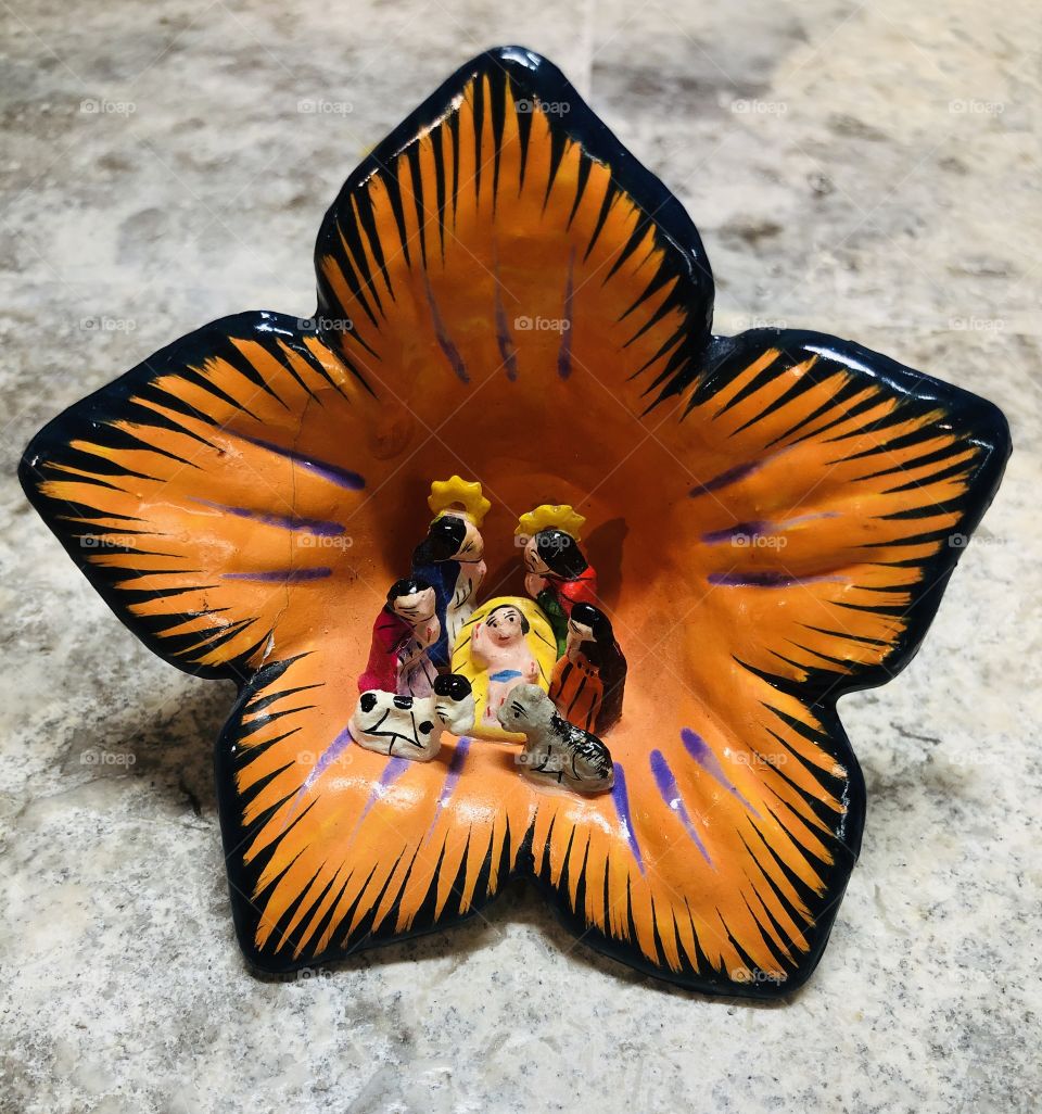 Miniature Nativity scene in a flower 