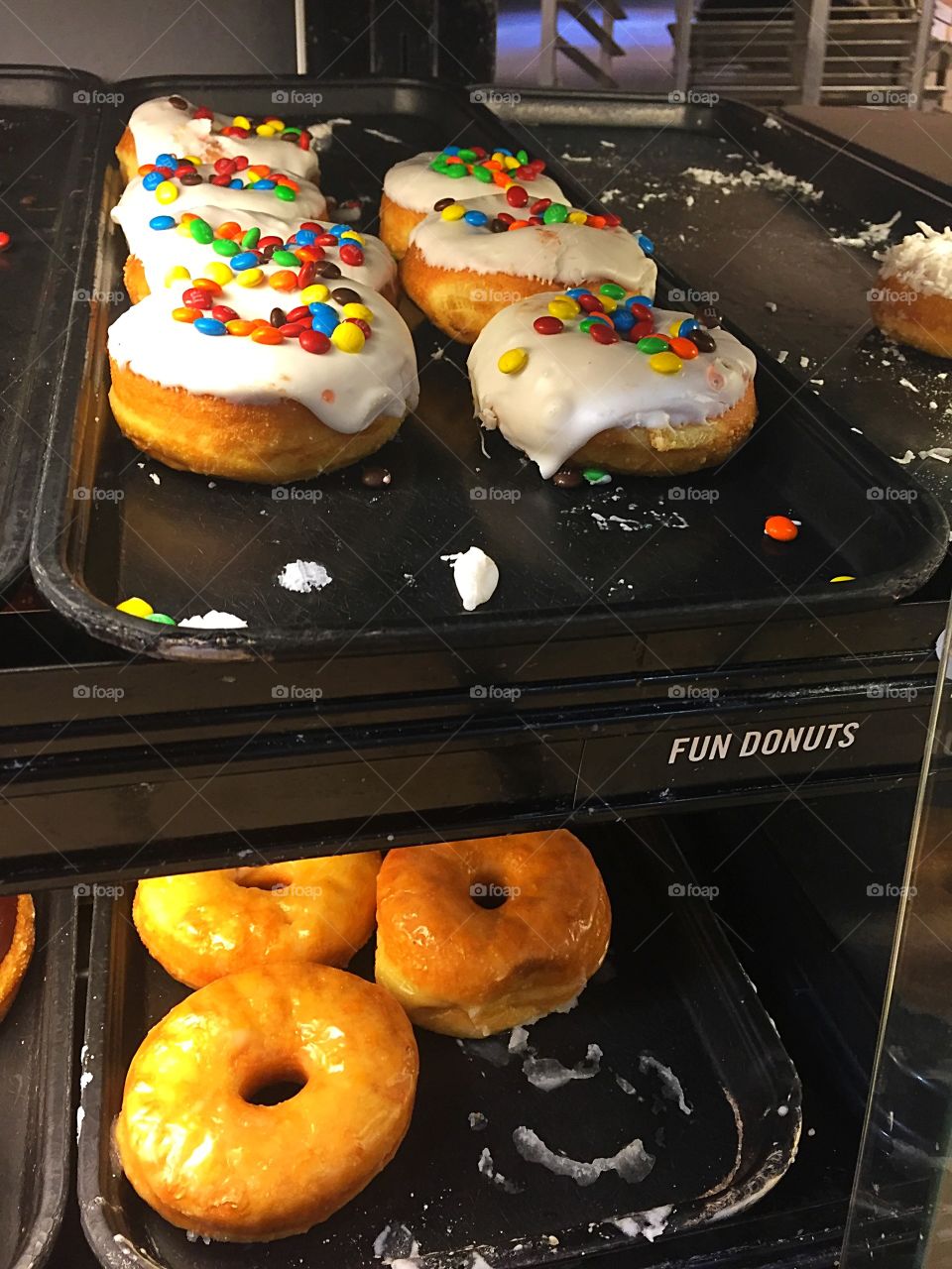 Trays of tasty donuts. 