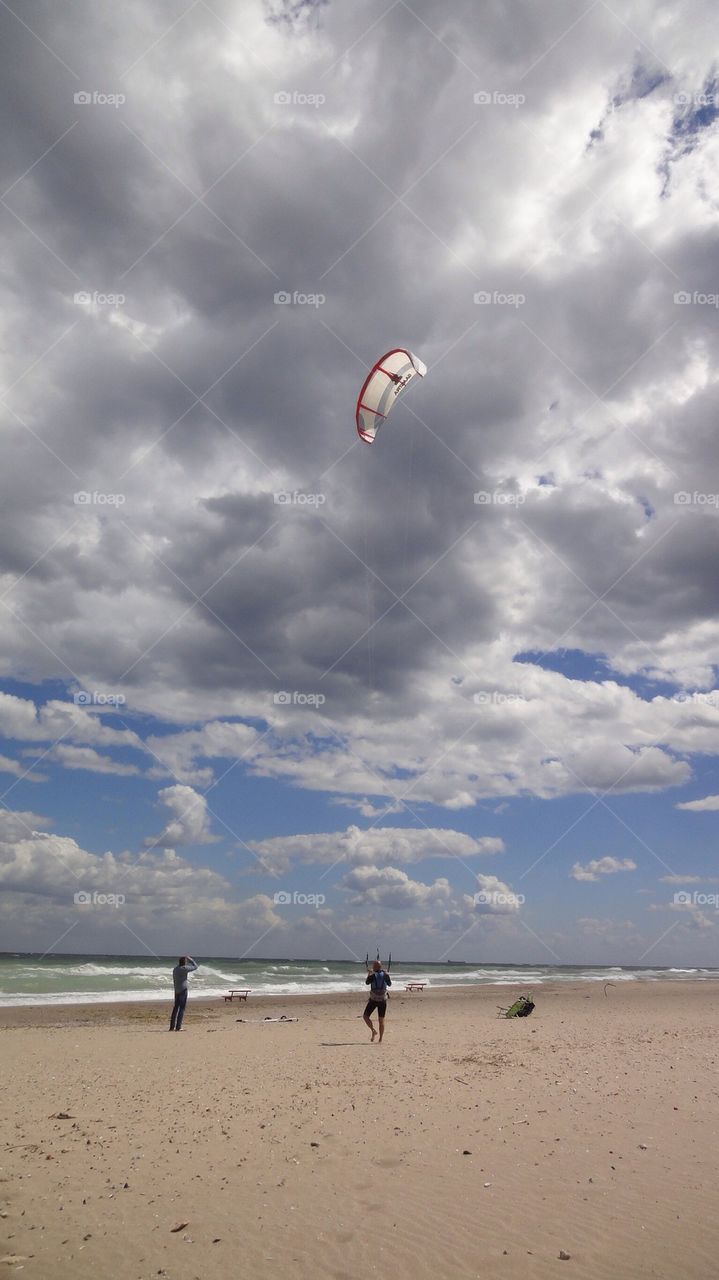 Kite surfing in cloudy day