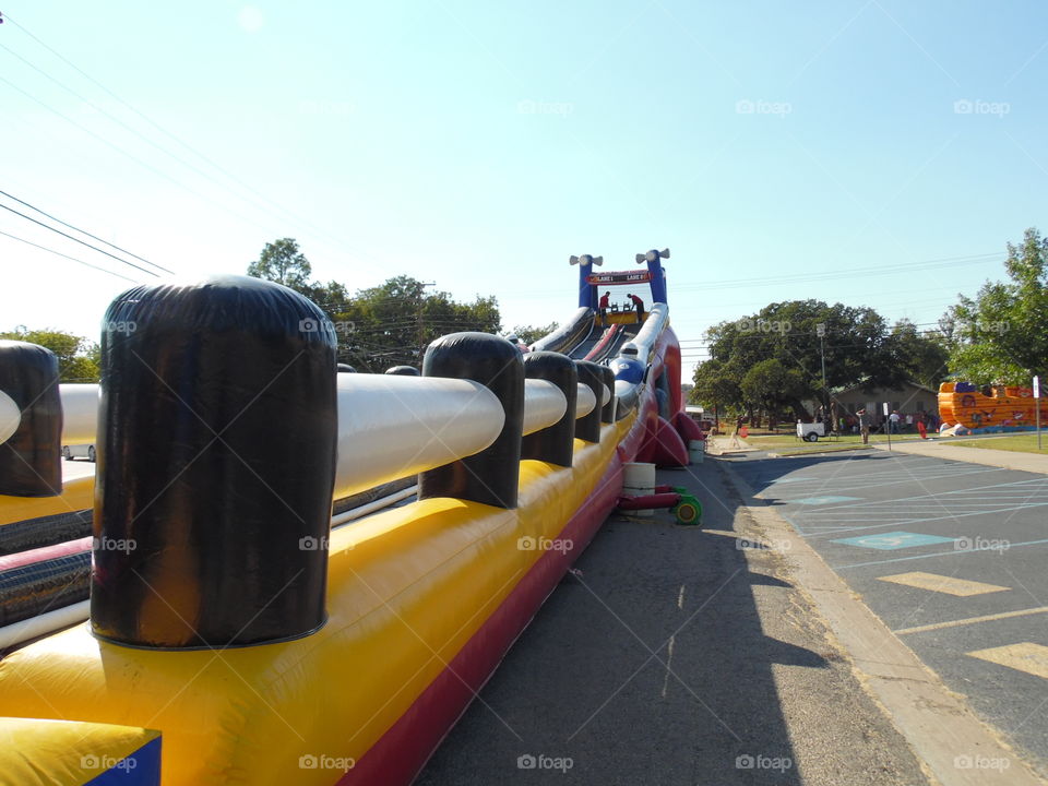 ready, set, go. This is a picture of some race cars on a slide.
