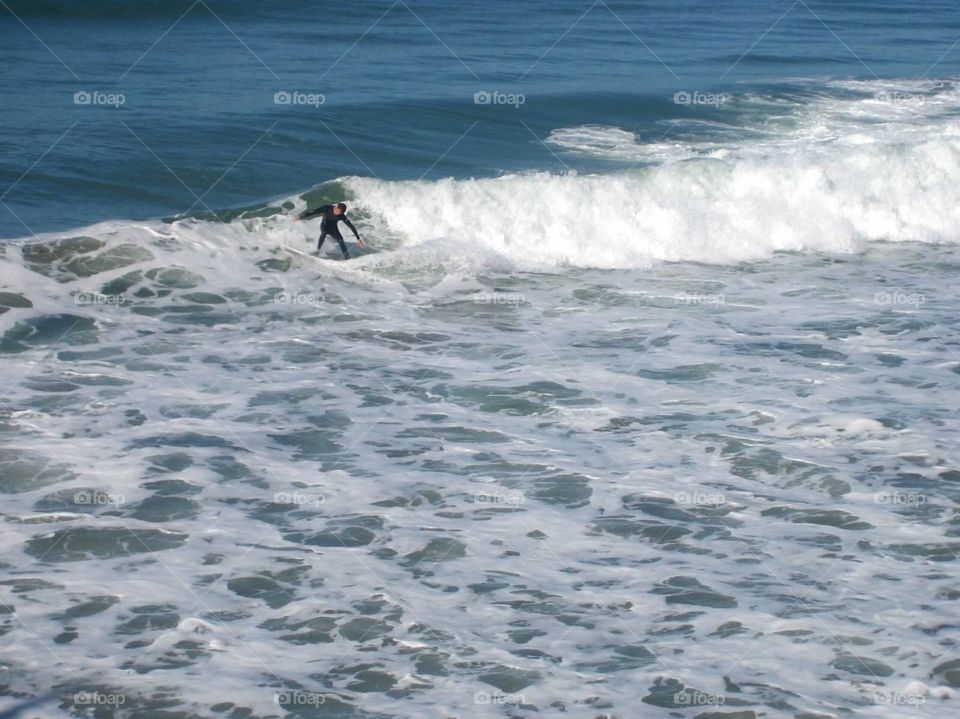 Riding the Waves. Surfer in Southern California 