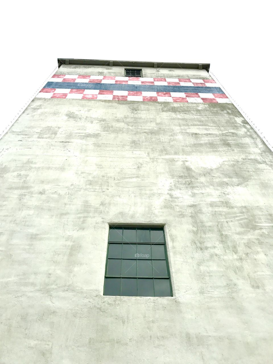 Looking into sky from beneath grain Elevator