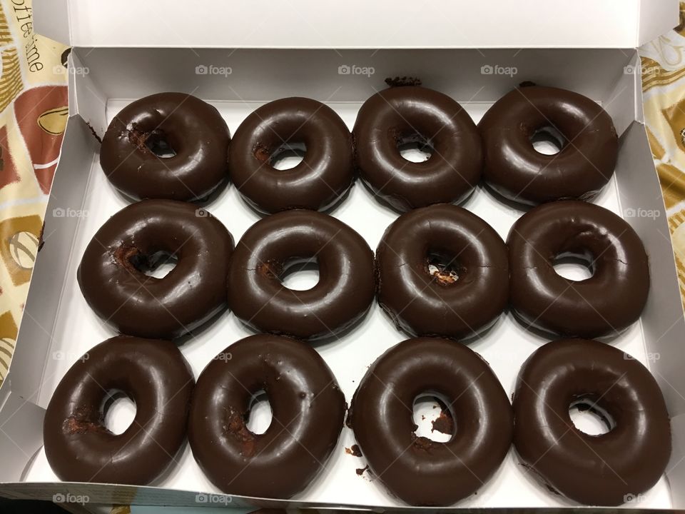 Krispy Kreme special edition solar eclipse chocolate covered original glazed doughnuts 