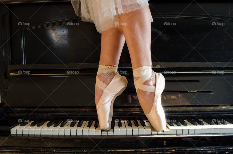 Ballerina Walking on A Piano