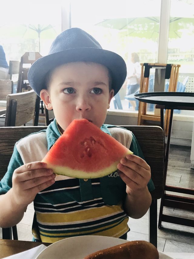 Child eating watermelon