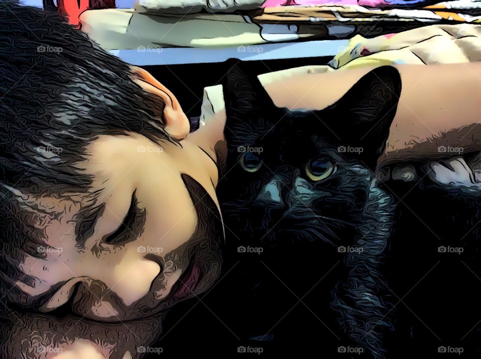 A boy with cat