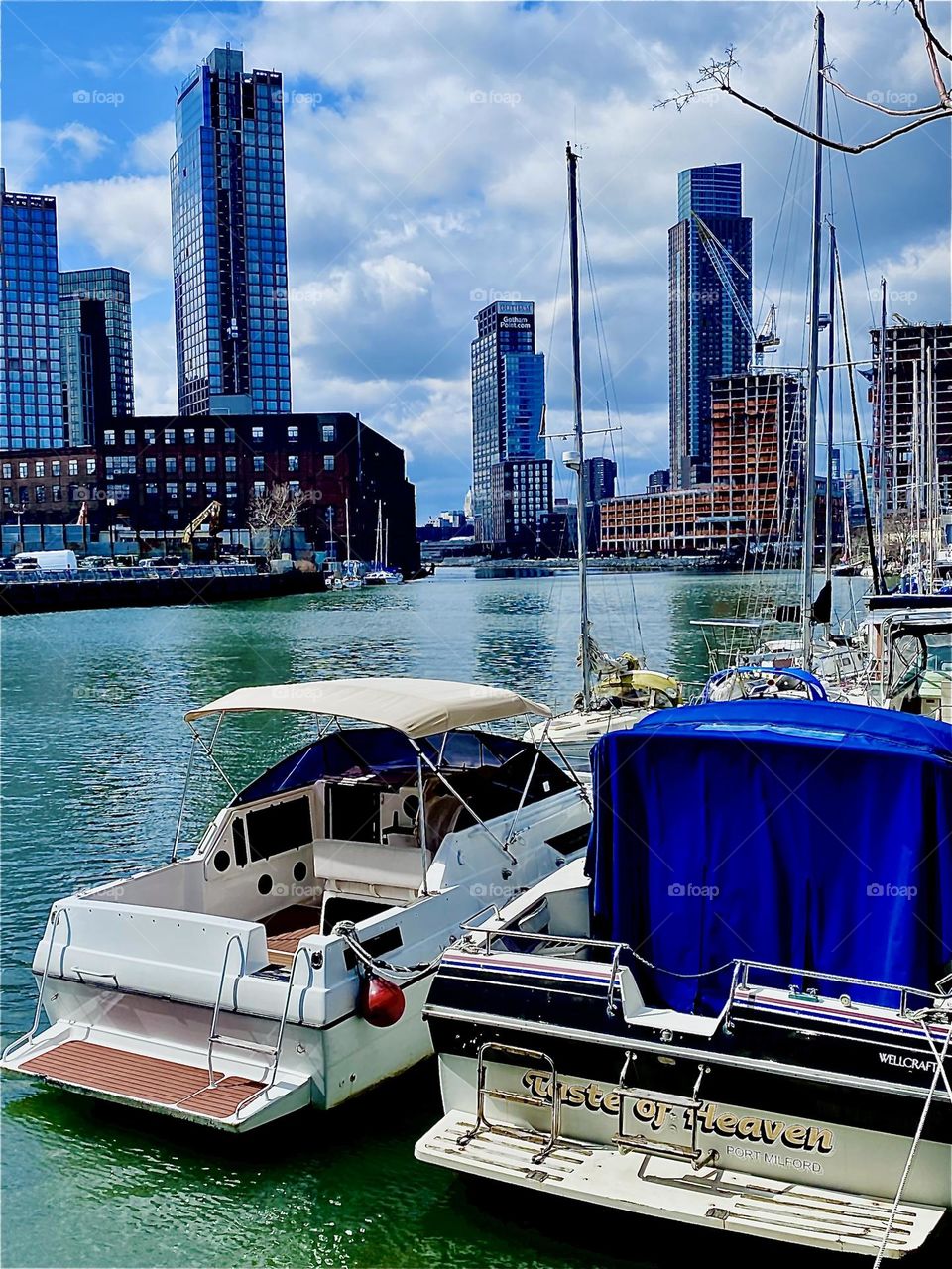 A charming impression of beautiful “Newtown Creek” by the “Pulaski Bridge” in LIC, Queens on a mostly sunny day in March of 2023. Hypnotic Productions