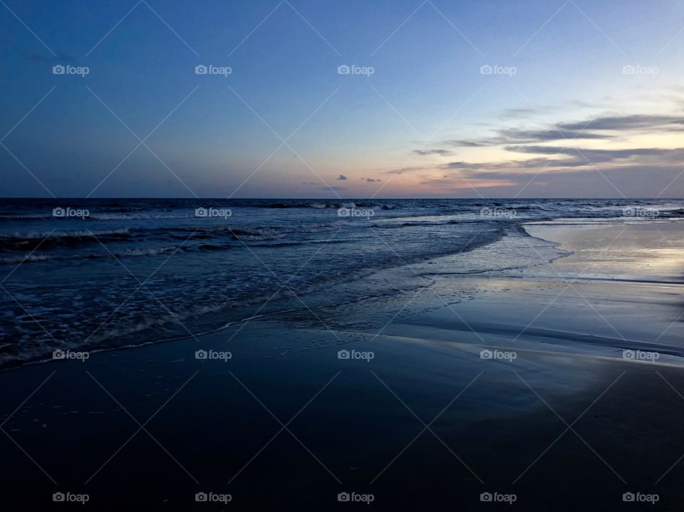 Beautiful beach sunset photo. Tranquil desktop background.